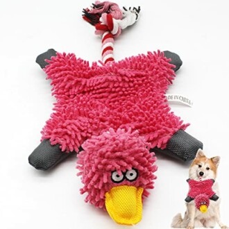 Plush pink bird dog toy with rope tail